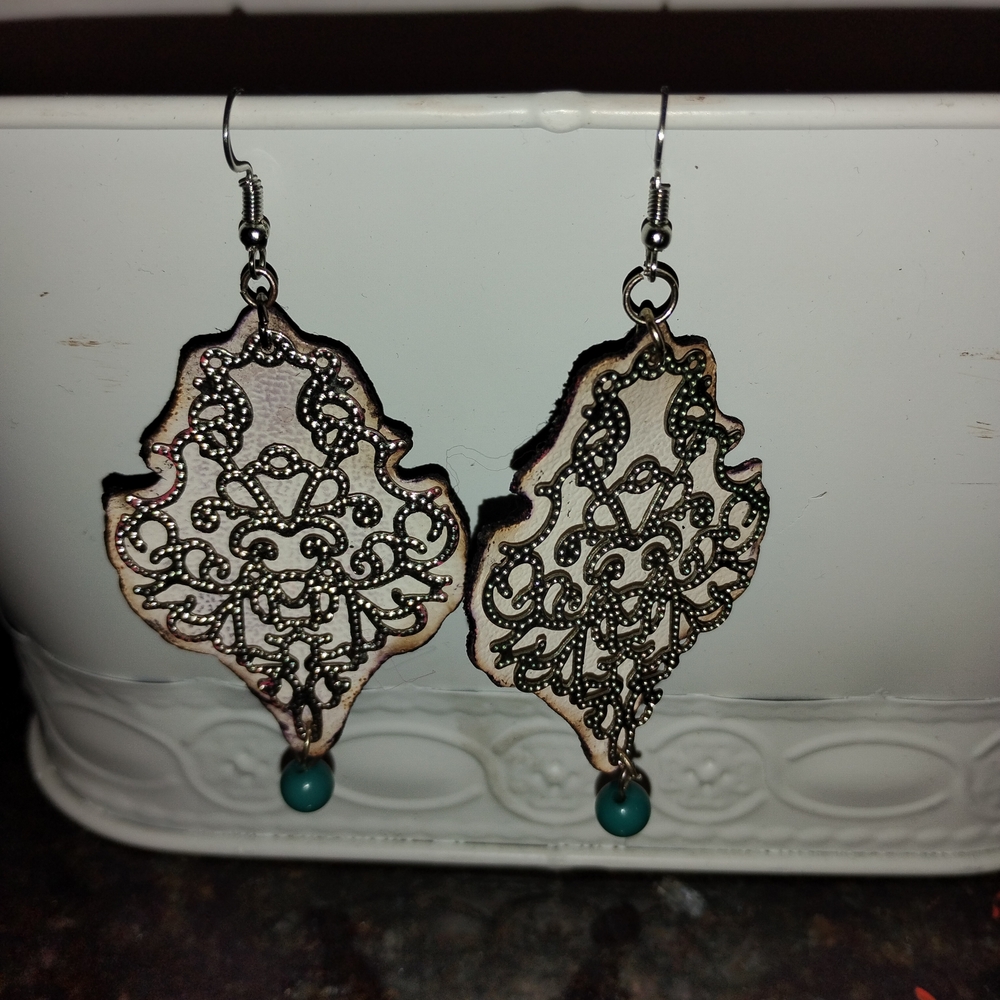 Intricate Black and Cream Filigree Earrings with Turquoise Accents